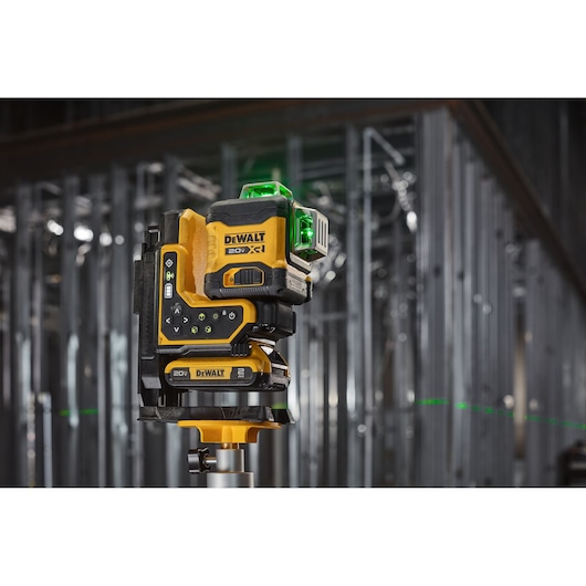 Hero shot of the 20V MAX* XR® Remote Control 360º Line Laser showing a line on the wall