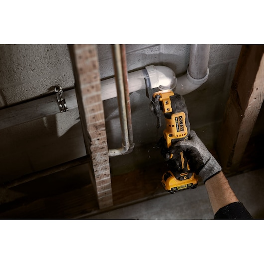 12V XR Brushless Ultra Compact 14mm SDS Plus Hammer Drill drilling through breeze blocks