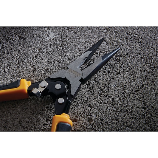 Aggressive cross hatch tooth design feature of Compound Action Long Nose Pliers.